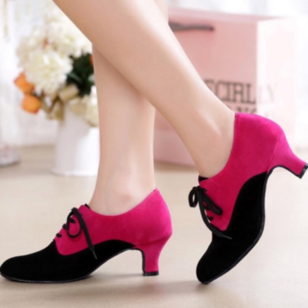 Pink and black tango heels